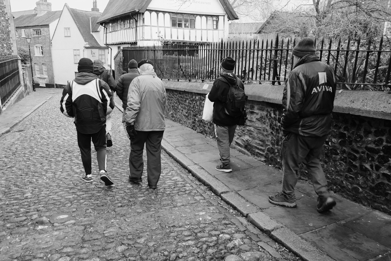 Men walking together in Norwich as part of a lifestyle medicine programme in Norfolk.