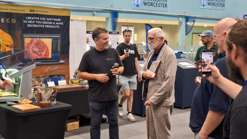 Henry Gowman, Norfolk’s UKMSA Ambassador, collects his award at ShedFest 26